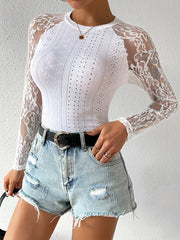 Elegant blus med spets och sömmar