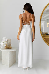 White long dress with narrow straps and hollow-out details