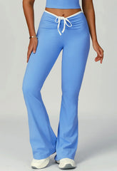 Sporty flared pants with bow detail
