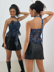 Blommig topp volangväst