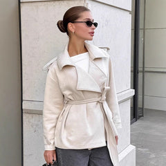 Trench-inspired short jacket with tie belt and wide lapels