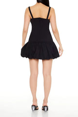 Black mini dress with balloon skirt