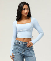 Long-sleeved crop top with contrasting details