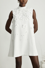 White sleeveless dress with 3D flowers