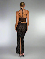 Lyxig transparent långklänning med utskärning