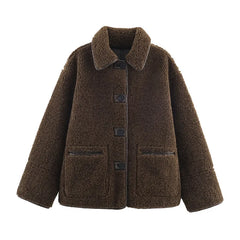 Brown teddy jacket with buttons and zipper pockets