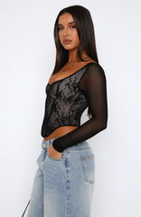 Svart bustier med blixtlås och lång ärm