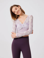 Floral patterned crop top with mesh sleeves