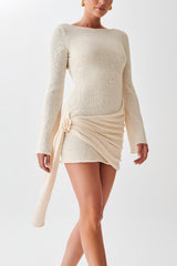 Cream boat-neck mini dress with side-tied drape