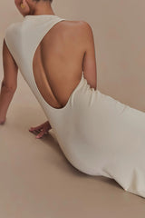 Cream sleeveless maxi dress with high neck