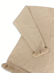 V-ringad tröja med volang i nederkanten