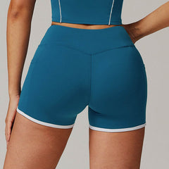 Sporty high-waisted shorts with contrasting details