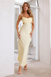 Light yellow long dress with cutouts