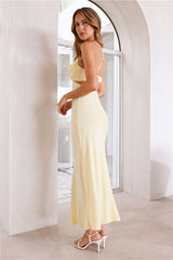 Light yellow long dress with cutouts