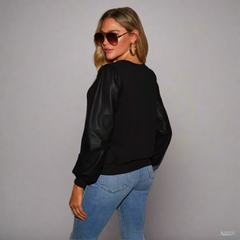 Lädersömmar långärmad rund hals