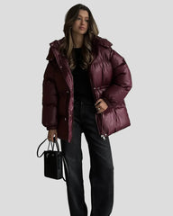 Shiny puffer jacket with hood and drawstring waist