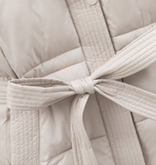 Vadderad midjejacka med bälte