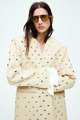 Cream blazer with silver studs