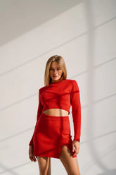 Red knit set with crop top and skirt