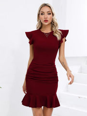 Ruffled dress with defined waist