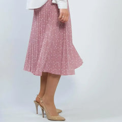 Pink pleated skirt with white polka dots