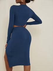 Set av lå ngärmad crop top och högmidjad kjol med slits