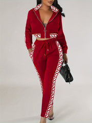 Sportblus och byxor med printdetaljer