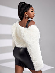 Enkelsidig fuskpälsjacka med låga ärmar