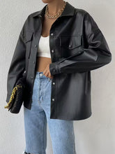 Black oversized shirt jacket with snap buttons