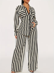 Randig skjorta med långa ärmar och vida byxor