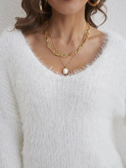 Vit fluffig stickad tröja