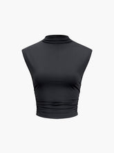 Black sleeveless crop top with high neck and pleated waist