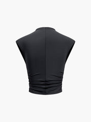 Black sleeveless crop top with high neck and pleated waist