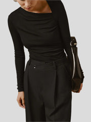 Seamless top with long sleeves and asymmetrical neckline