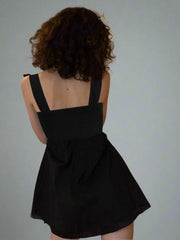 Black mini dress with bow