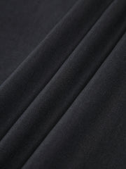 Black dress with fitted waist and bow detail