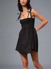 Black mini dress with bow