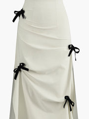 White midi skirt with black bow details