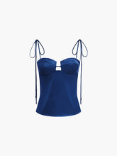 Blue satin top with bow straps and cutout