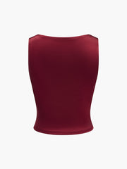 Shiny burgundy top with draped bust