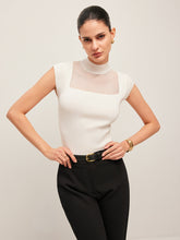 Sleeveless top with mesh details and high neck