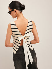 Sleeveless black and white striped knit top