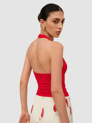 Red V-neck backless top with pleated waist