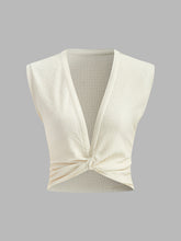 Sleeveless twisted top with structure