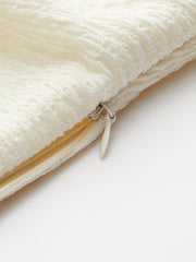 Sleeveless twisted top with structure