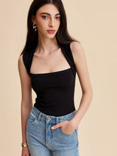 Black ribbed sleeveless top with open back