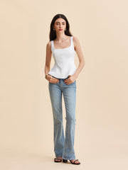 White corset top with structured peplum