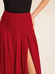 Red pleated flared midi skirt