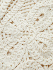 Cream-colored crochet cardigan with floral pattern
