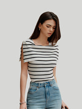 Sleeveless striped boat neck knit top